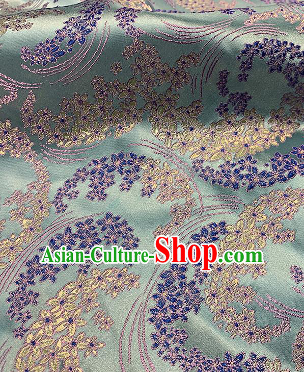 Chinese Traditional Sakura Pattern Green Silk Fabric Brocade Drapery Qipao Dress Damask Material Chinese Traditional Sakura Pattern Green Silk Fabric Brocade Drapery Qipao Dress Damask Material