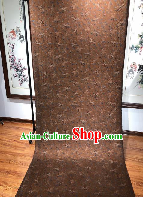 Asian Chinese Traditional Cloud Crane Pattern Design Brown Gambiered Guangdong Gauze Fabric Silk Material Asian Chinese Traditional Cloud Crane Pattern Design Brown Gambiered Guangdong Gauze Fabric Silk Material