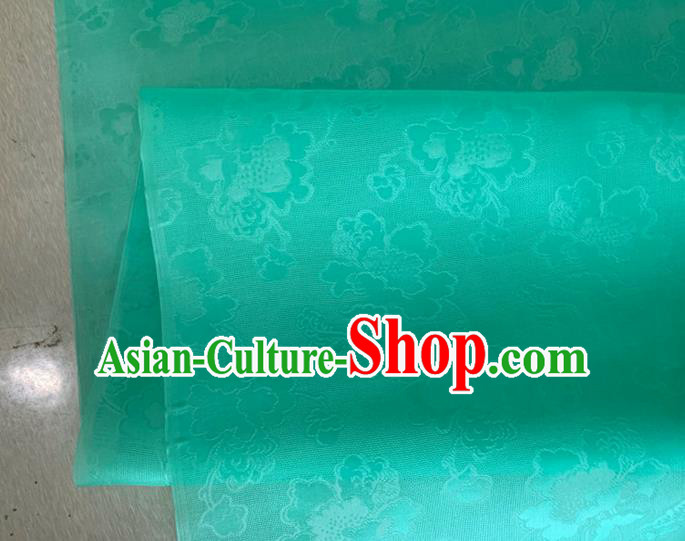 Asian Chinese Classical Peony Pattern Design Green Jacquard Fabric Traditional Cheongsam Silk Material Asian Chinese Classical Peony Pattern Design Green Jacquard Fabric Traditional Cheongsam Silk Material
