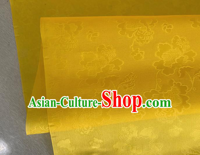 Asian Chinese Classical Peony Pattern Design Yellow Jacquard Fabric Traditional Cheongsam Silk Material Asian Chinese Classical Peony Pattern Design Yellow Jacquard Fabric Traditional Cheongsam Silk Material