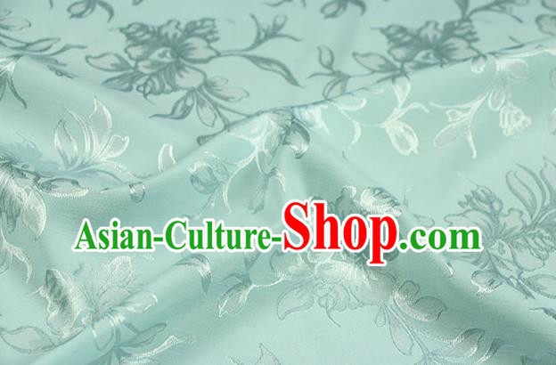 Chinese Traditional Magnolia Pattern Design Green Brocade Fabric Hanfu Dress Satin Drapery Chinese Traditional Magnolia Pattern Design Green Brocade Fabric Hanfu Dress Satin Drapery
