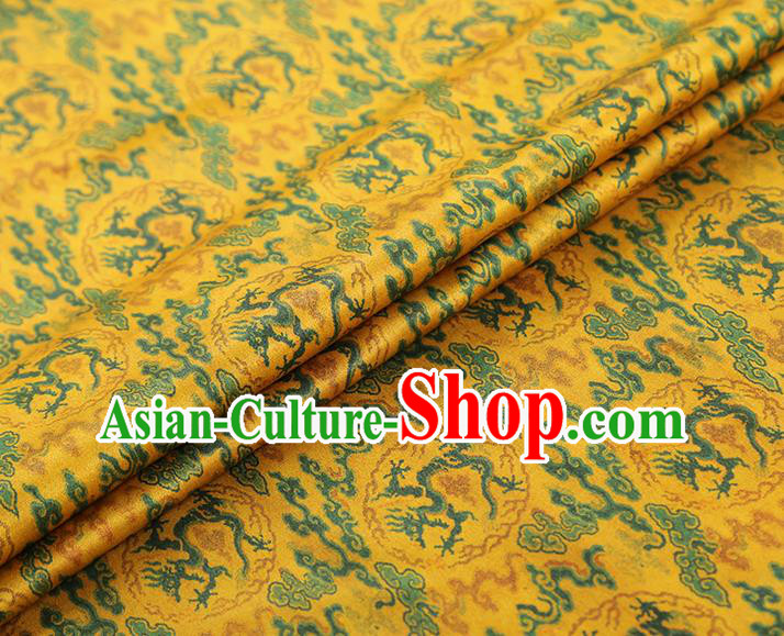China Traditional Cheongsam Dragons Pattern Brocade Fabric Classical Yellow Gambiered Guangdong Gauze China Traditional Cheongsam Dragons Pattern Brocade Fabric Classical Yellow Gambiered Guangdong Gauze