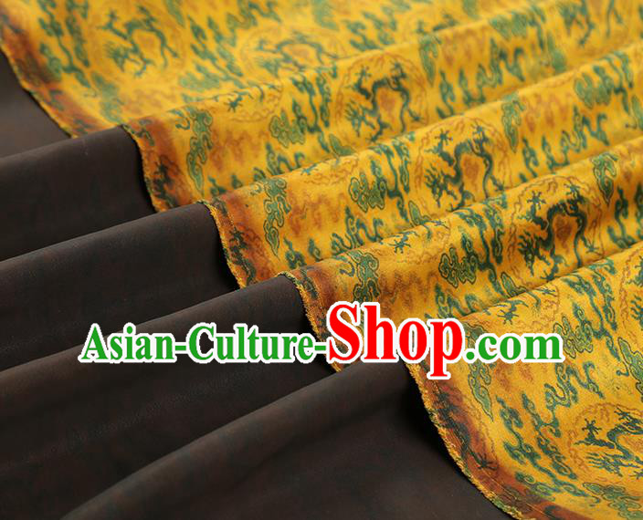 China Traditional Cheongsam Dragons Pattern Brocade Fabric Classical Yellow Gambiered Guangdong Gauze China Traditional Cheongsam Dragons Pattern Brocade Fabric Classical Yellow Gambiered Guangdong Gauze
