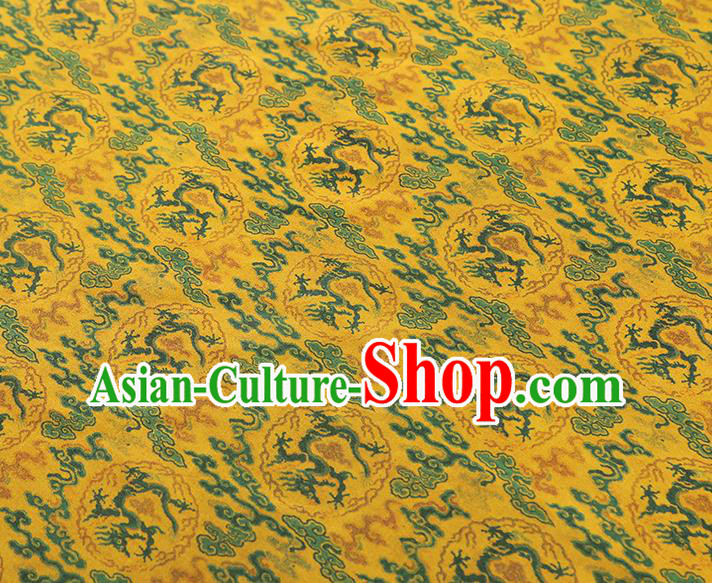 China Traditional Cheongsam Dragons Pattern Brocade Fabric Classical Yellow Gambiered Guangdong Gauze China Traditional Cheongsam Dragons Pattern Brocade Fabric Classical Yellow Gambiered Guangdong Gauze
