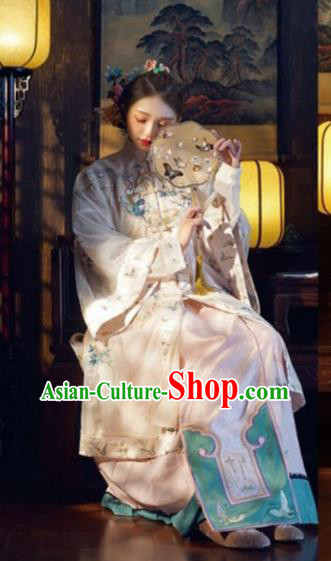 China Traditional Qing Dynasty Court Woman Costumes Ancient Imperial Concubine Embroidered Clothing Complete Set China Traditional Qing Dynasty Court Woman Costumes Ancient Imperial Concubine Embroidered Clothing Complete Set