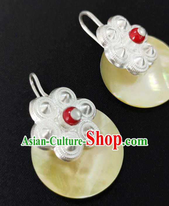 China Traditional Yi Nationality Silver Ear Accessories Handmade Liangshan Ethnic Yellow Shell Earrings China Traditional Yi Nationality Silver Ear Accessories Handmade Liangshan Ethnic Yellow Shell Earrings