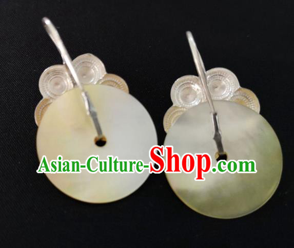 China Traditional Yi Nationality Silver Ear Accessories Handmade Liangshan Ethnic Yellow Shell Earrings China Traditional Yi Nationality Silver Ear Accessories Handmade Liangshan Ethnic Yellow Shell Earrings