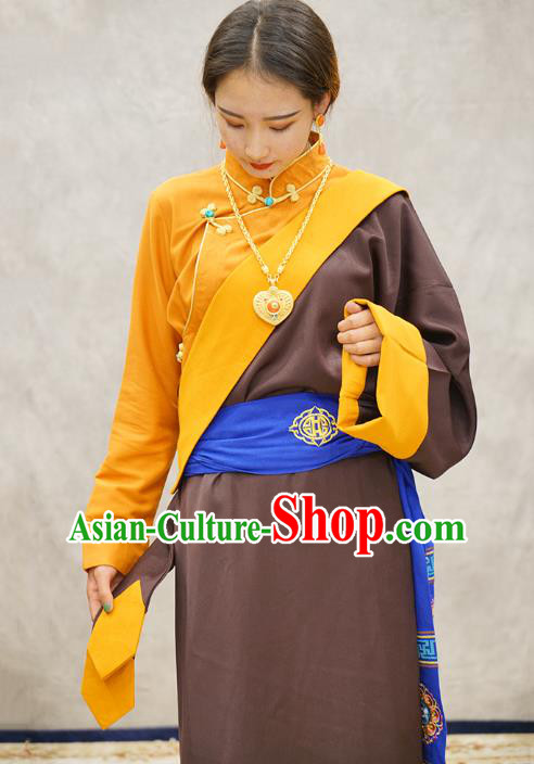 China Zang Nationality Kangba Clothing Brown Tibetan Robe Ethnic Woman Costume China Zang Nationality Kangba Clothing Brown Tibetan Robe Ethnic Woman Costume