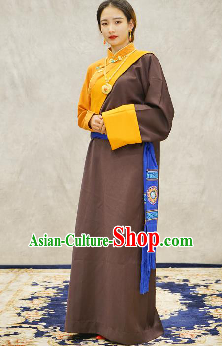 China Zang Nationality Kangba Clothing Brown Tibetan Robe Ethnic Woman Costume China Zang Nationality Kangba Clothing Brown Tibetan Robe Ethnic Woman Costume