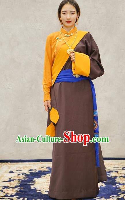 China Zang Nationality Kangba Clothing Brown Tibetan Robe Ethnic Woman Costume China Zang Nationality Kangba Clothing Brown Tibetan Robe Ethnic Woman Costume
