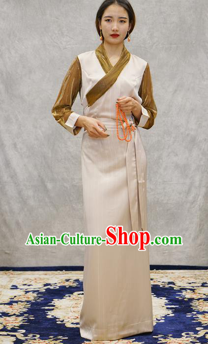 China Tibetan Ethnic Female Beige Dress Zang Nationality Bola Clothing China Tibetan Ethnic Female Beige Dress Zang Nationality Bola Clothing