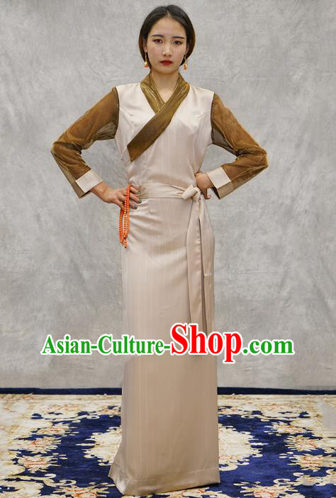 China Tibetan Ethnic Female Beige Dress Zang Nationality Bola Clothing China Tibetan Ethnic Female Beige Dress Zang Nationality Bola Clothing