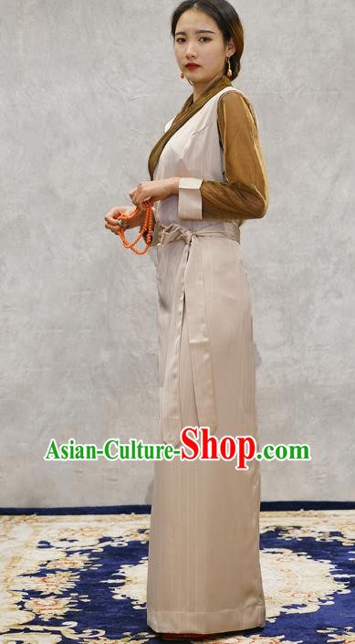 China Tibetan Ethnic Female Beige Dress Zang Nationality Bola Clothing China Tibetan Ethnic Female Beige Dress Zang Nationality Bola Clothing