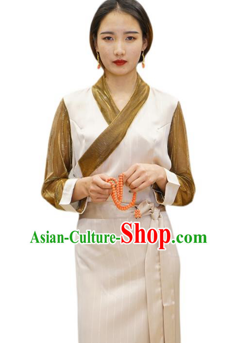 China Tibetan Ethnic Female Beige Dress Zang Nationality Bola Clothing China Tibetan Ethnic Female Beige Dress Zang Nationality Bola Clothing