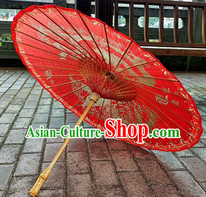 China Classical Wedding Umbrella Hand Painting Phoenix Dragon Umbrella Traditional Red Oilpaper Umbrella Craft China Classical Wedding Umbrella Hand Painting Phoenix Dragon Umbrella Traditional Red Oilpaper Umbrella Craft