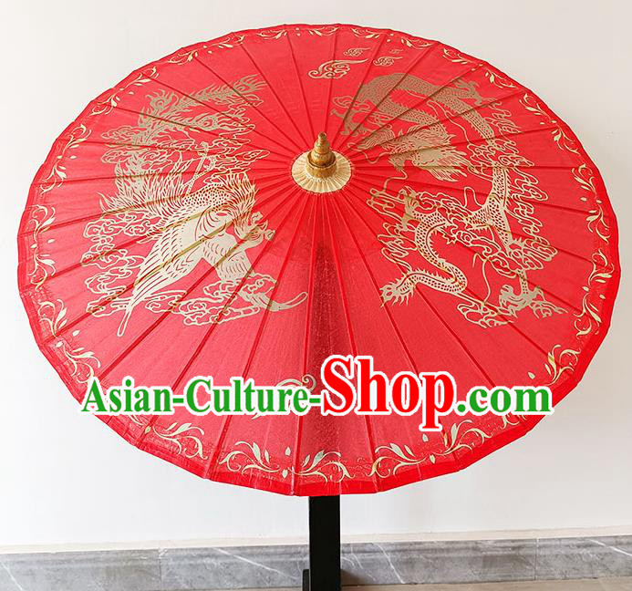 China Classical Wedding Umbrella Hand Painting Phoenix Dragon Umbrella Traditional Red Oilpaper Umbrella Craft China Classical Wedding Umbrella Hand Painting Phoenix Dragon Umbrella Traditional Red Oilpaper Umbrella Craft