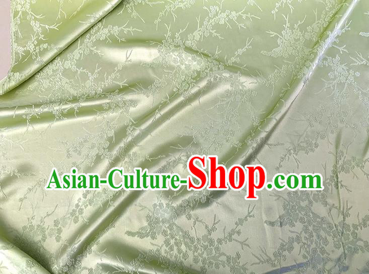 Light Green China Traditional Material Classical Embossed Plum Blossom Pattern Silk Cheongsam Stretch Fabric Light Green China Traditional Material Classical Embossed Plum Blossom Pattern Silk Cheongsam Stretch Fabric